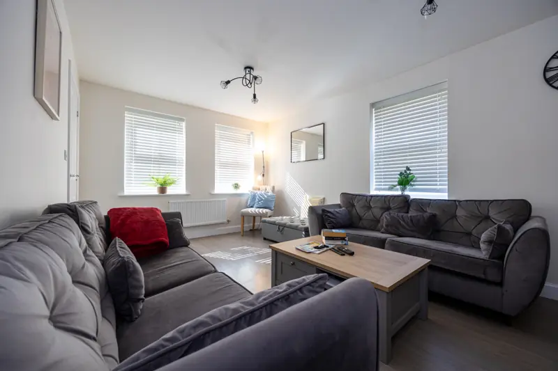 Sitting room with three sofas